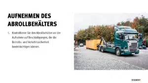 Vortrag Abrollkipper Abrollkipper-LKW neben einem gelben Abrollbehälter auf einem gepflasterten Betriebsgelände